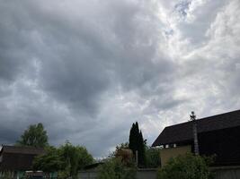 Clouds over countryside as weather changes photo