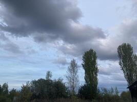 Thunderclouds before rain in the village photo