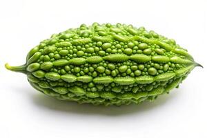 a green fruit with many small green dots on it photo