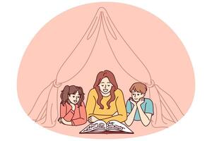 Nanny and two small children reading book lying on floor in tent enjoying fairy tale story vector
