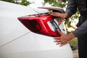 Technicians from service center inspect and assist customers cars that are having problems while traveling build confidence in customers who choose buy car from service center and receive help quickly photo