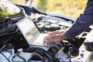 car service center mechanics are checking condition car and engine make sure they are ready use and in perfect condition according center warranty. periodic vehicle inspections for safety in driving. photo