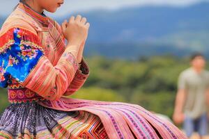 young woman clasped her hands together in prayer asking for forgiveness from God based on her Christian beliefs and faith in God teachings. concept prayer and intercession according beliefs about God photo