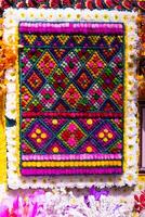 backdrop of beautifully arranged flower and bright colors is backdrop for flower in beautifully arranged garden at flower festival. Beautiful colorful background with Copy Space for inserting text. photo