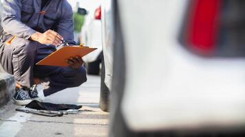 car service center mechanics are checking condition car and engine make sure they are ready use and in perfect condition according center warranty. periodic vehicle inspections for safety in driving. photo