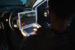 Technicians from service center inspect and assist customers cars that are having problems while traveling build confidence in customers who choose buy car from service center and receive help quickly photo