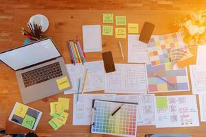 mobile application development team is studying and designing ux ui system to display and color in application on smartphone to work efficiently and not cause the ux ui system to have any errors. photo