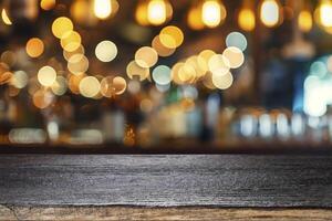 Empty wooden table for present product on coffee shop blur background. photo