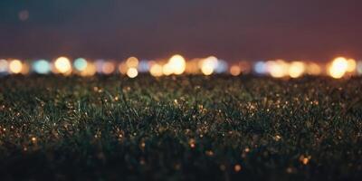 Artificial turf in the vicinity. The lights in the background are blurred. photo