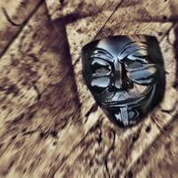 This essential characteristic of hiding and revealing personalities or moods is common to all masks. photo
