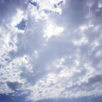 When the sky is cloudy, it's so full of clouds that you can't see the sun. photo