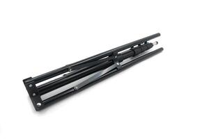 foldable lighting tripod on white background photo