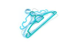 several used hangers on a white background photo