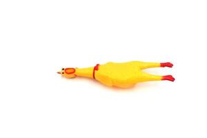 cute rubber chicken toy on white background photo