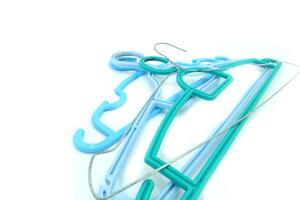 several used hangers on a white background photo