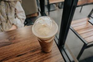 mocha float on a wooden table photo