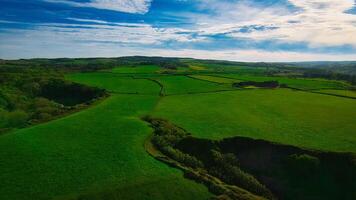 Aerial view of green fields and hills in Sandsend, Yorkshire photo