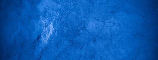 Abstract Blue Cement Wall Texture with Gradient Background photo