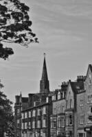 Historic buildings and church steeple in black and white in Harrogate, North Yorkshire photo