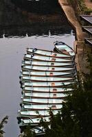 Rowboats at Rest by the Lake in Knaresborough, North Yorkshire photo