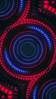 Vertical - a circle of blinking neon colored blue and red glowing digital data lights - retro technology background. video