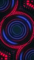 Vertical - a circle of blinking neon colored blue and red glowing digital data lights - retro technology background. video