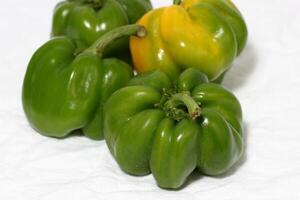 sweet green bell pepper, isolated on white background, clipping path, full depth of field, paprika photo