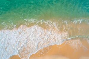 Beautiful Beach View from Above White Sands and Blue Waves Create a Breathtaking Coastal Scene, Offering Serenity and Tranquility in Nature's Splendid Canvas photo