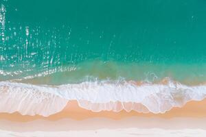 Beautiful Beach View from Above White Sands and Blue Waves Create a Breathtaking Coastal Scene, Offering Serenity and Tranquility in Nature's Splendid Canvas photo