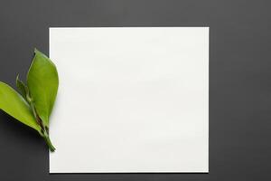 Beautiful Mockup Paper on Wooden Background Combined with Leaves, Creating a Charming and Natural Setting for Creative Designs and Artistic Presentations photo