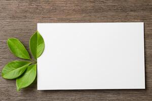 Wooden Background Combined with Leaves Enhances the Elegance of Paper, Creating a Stunning Composition Inspired by Nature's Harmony photo