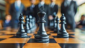 Man in Suit Standing Behind Chess Board photo