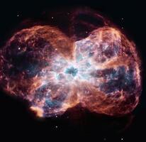 Planetary nebula NGC 2440 with a dwarf star at the center of the object. photo