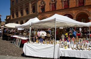 Bologna Italy May 11, 2024 Antique street market in Santo Stefano square. photo