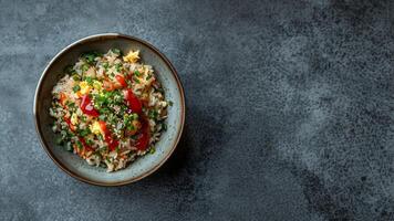 Top View of Spicy Asian Fried Rice in a Bowl on Table. Background with Empty Space for Text photo
