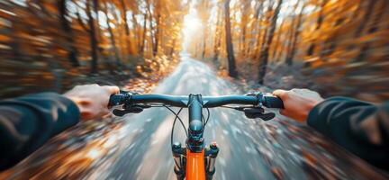 Bicycle Riding Photo. Close Up of Hands on Bicycle Handlebar in the Autumn Forest. Blurred Forest Background. Sunny Day. High-Speed Bicycle Riding Background. photo