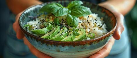 Person Holding a Bowl of Rice and Vegetables photo
