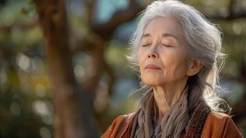 Woman Sitting on Bench With Eyes Closed photo