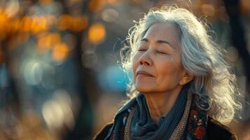 Woman Sitting on Bench With Eyes Closed photo