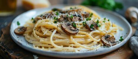 Plate of Pasta With Mushrooms and Parmesan Cheese photo