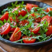 Black Bowl Filled With Salad on Table photo