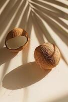 Two Coconuts on Table photo