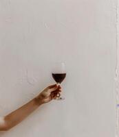 Person Holding Glass of Wine photo