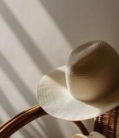 White Hat Resting on Wicker Basket photo