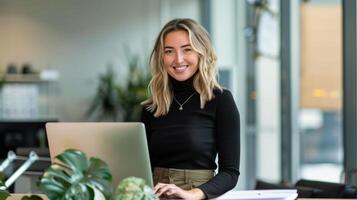 Woman Standing in Front of Laptop Computer photo