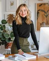 Woman Standing in Front of Laptop Computer photo