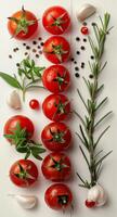 Tomatoes, Garlic, and Herbs on White Surface photo