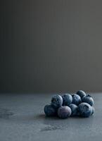 White Bowl Filled With Blueberries on Table photo
