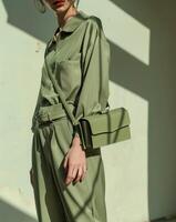 Woman in Green Dress With Fanny Bag photo