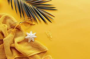 Towel and Starfish on Yellow Background photo